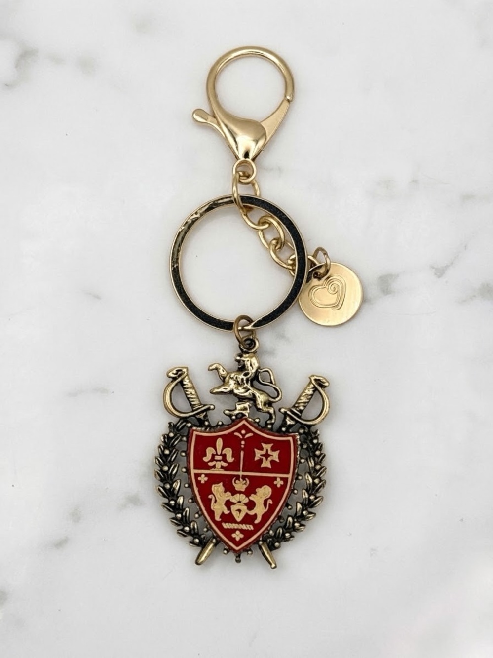 Vintage BSK Heraldic Shells Royal Coat Of Arms Bag Charm Red Marbled Lucite